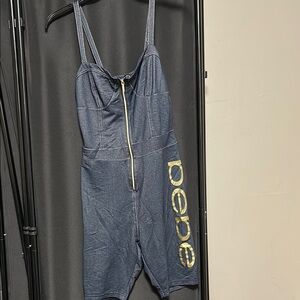 Bebe Denim Romper with Yellow Logo used like new